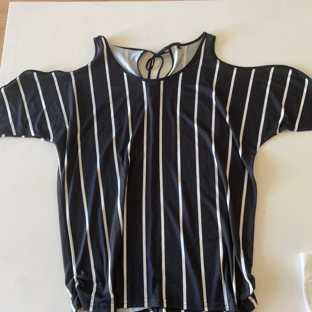 Black and white striped blouse. Open shoulder. Size XL.